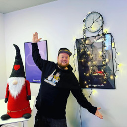 Magnus and Tilde in front of Christmas tree